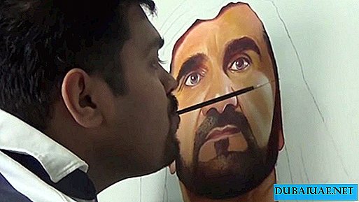 An artist in a wheelchair painted the ruler of Dubai for 500 hours, holding a brush with his teeth